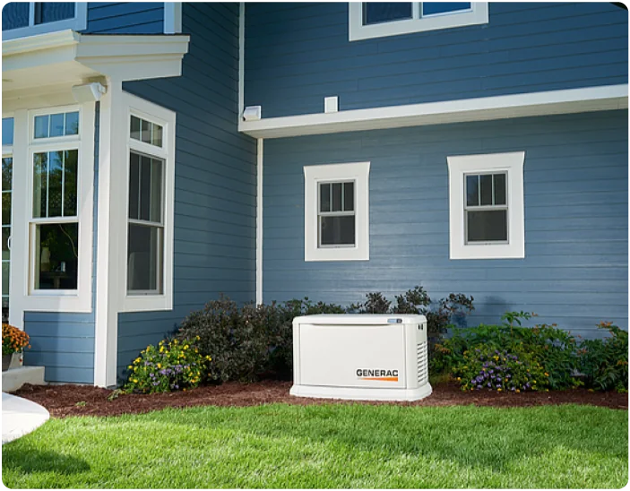 Whole-home standby generator installed beside a home